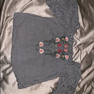 Francesca’s black flower shirt
